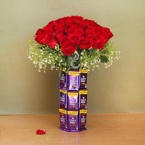 Combo Gift of 30 red roses and 18 Dairy milk arrangement