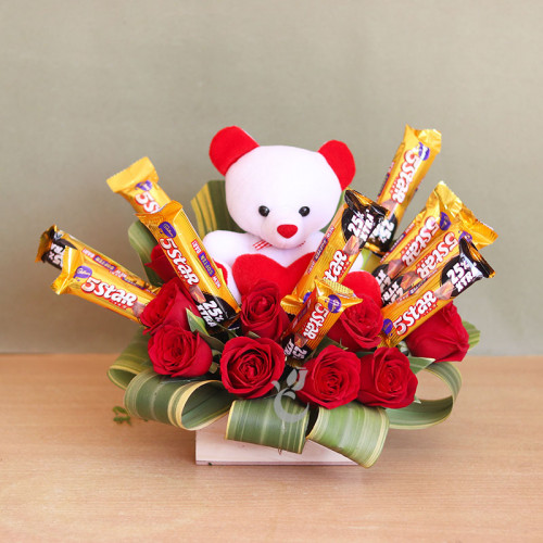 10 Five star chocolate+10 Red Roses+6 inch teddy in a box arrangement