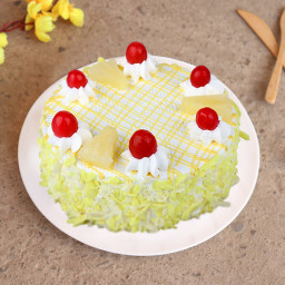 Half kg pineapple cake with juicy fruit chunks and cherry