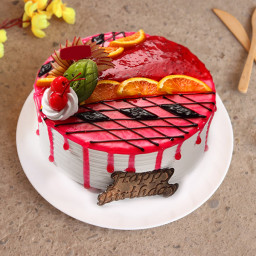 Fruit cake with strawberry glace on the top