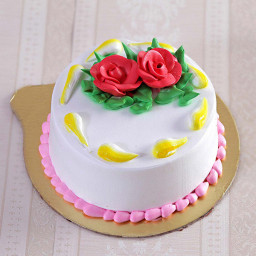 Vanilla cake topped with cream rose