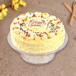 Butterscotch cake with colorful sprinkles on top