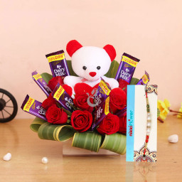 Gift Combo of 10 Cadbury Dairy Milk + 10 Red Roses + 1 Teddy(6 inch) In a Box Arrangement+1 rakhi