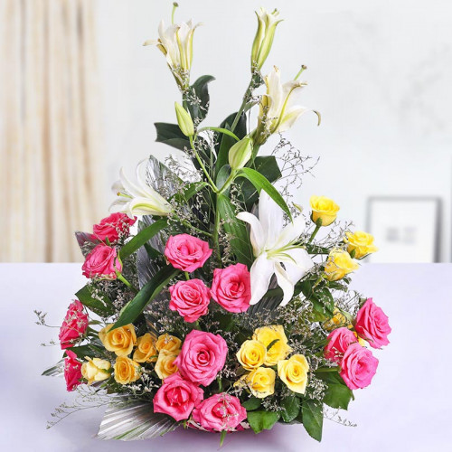 Basket Arrangement of 15 Pink, 15 Yellow Roses with 3 White Lilies