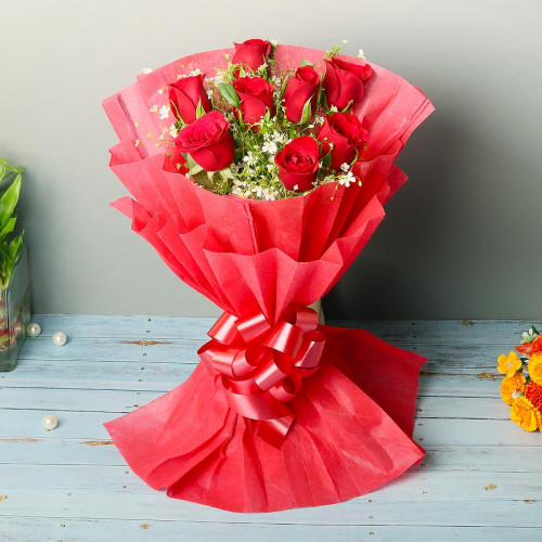8 Red Roses in Red Paper Packing