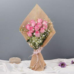 12 Pink Roses in Jute paper Packing