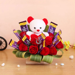 Gift Combo of 10 Cadbury Dairy Milk + 10 Red Roses + 1 Teddy(6 inch) In a Box Arrangement