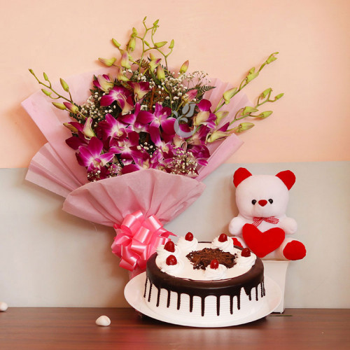Gift Combo of 6 Purple Orchid with Half kg Black Forest Cake and 6 Inch Teddy Bear