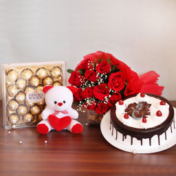 Combo Gift of 10 Red Roses + Half Kg Black Forest Cake + 24 pc Ferrero Rocher + Teddy