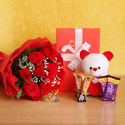 Lovely Combo of 10 Red Roses + 2 Cadbury Dairy Milk + Two 5 Star Chocolate + Greeting Card + A White Teddy