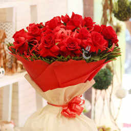 30 Red Roses in red and white paper packing