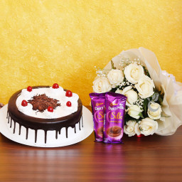Combo Gift of 12 White Roses with Half kg Blackforest Cake and 2 Dairy Milk Silk
