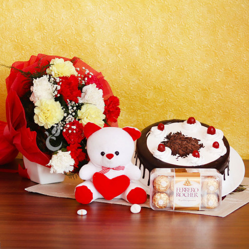 Combo Gift of Half kg Black Forest Cake +10 Mix Carnation + Teddy + 16 Ferrero Rocher