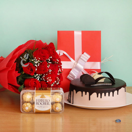 Half kg Chocolate cake +greeting card+Ferrero rocher+12 Red roses bouquet