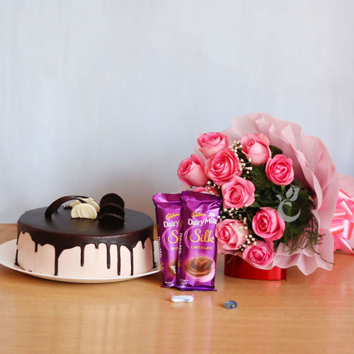 12 Pink Roses+Half kg Chocolate cake+ 2 Dairy Milk Silk