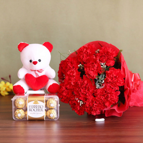 Gift Hamper of 12 Carnation with 6 Inch Teddy and 16 Ferrero Rocher