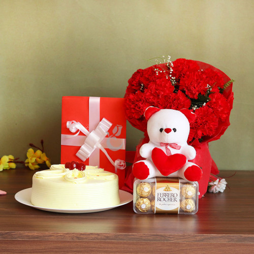 Combo of 12 Carnations + 6 Inch Teddy + One Greeting Card + 16 Ferrero Rocher + Half Kg Butterscotch Cake